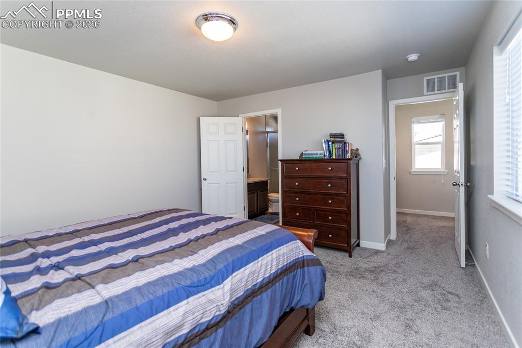 Image 28 of 34: Master Bedroom