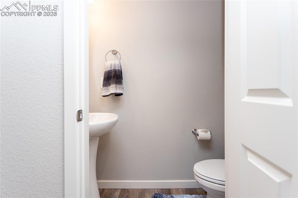 Image 9 of 34: 1/2 bath on the main level