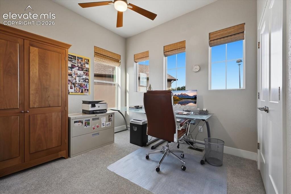 Image 19 of 39: Has a closet and is a bedroom/ they use as office. 