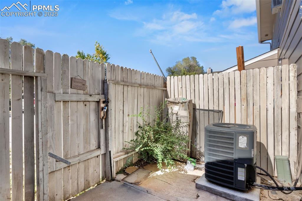 Image 24 of 31: Exterior view of a central air condition unit