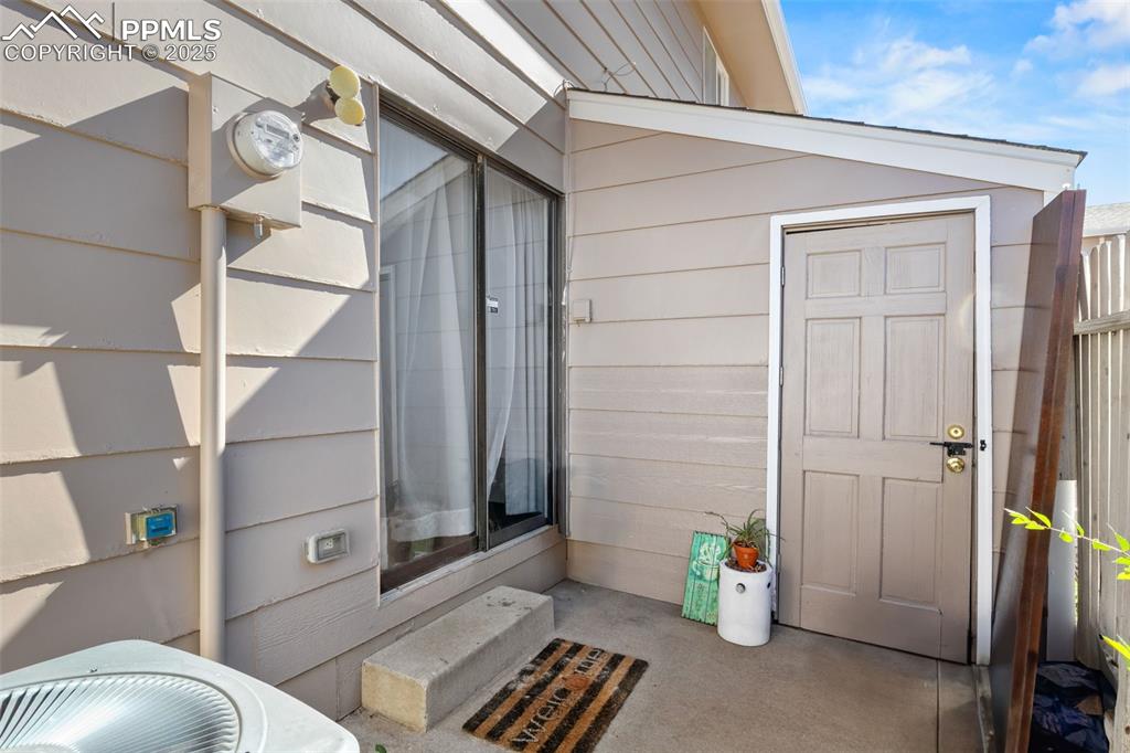 Image 26 of 31: Doorway to property