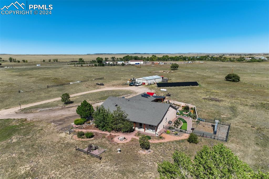 Image 8 of 48: Birds eye view of property featuring a rural view
