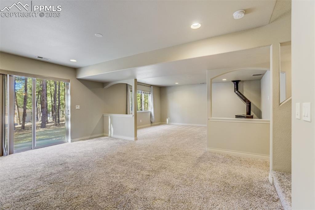 Image 23 of 38: Walkout basement family room