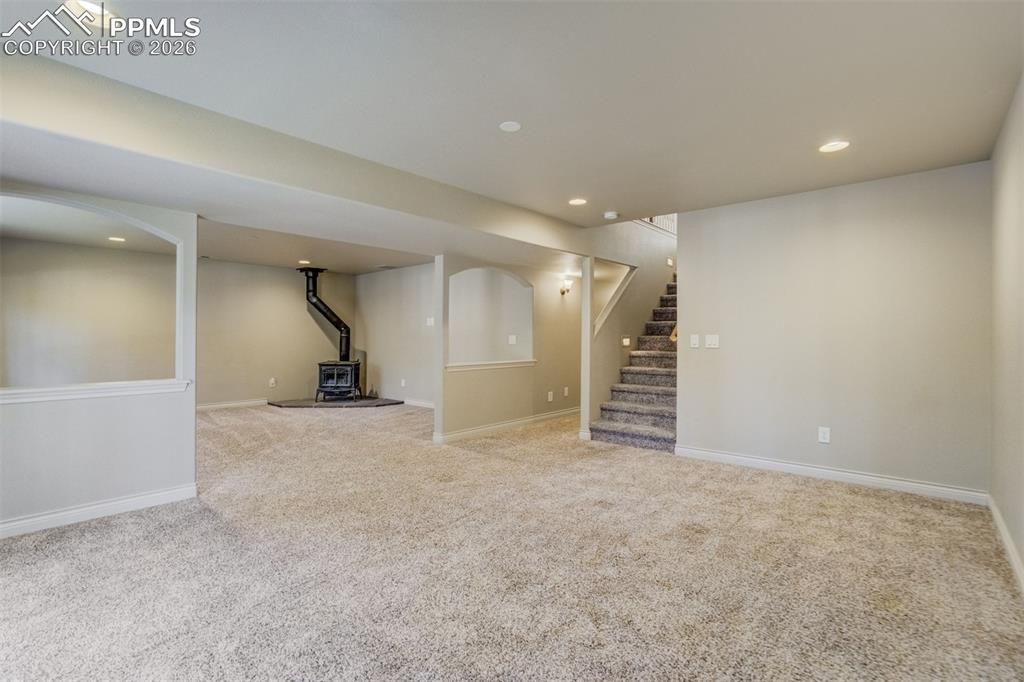 Image 24 of 38: Walkout basement family room