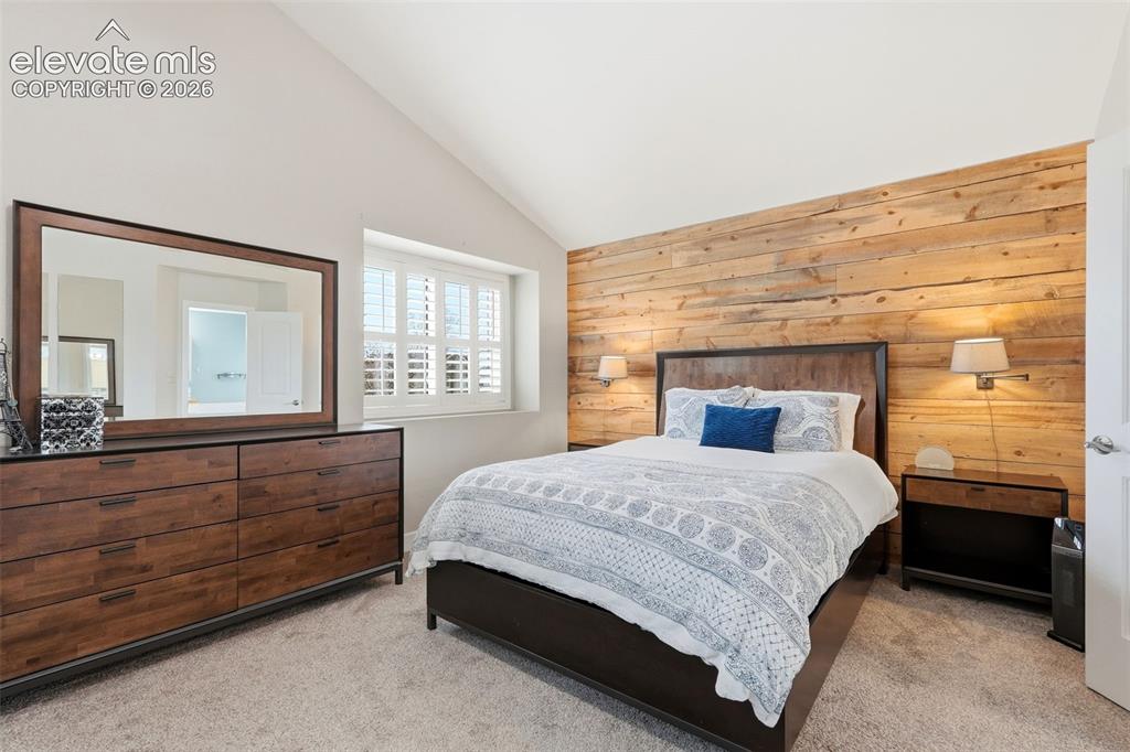 Image 28 of 50: Tasteful rustic wood accent wall