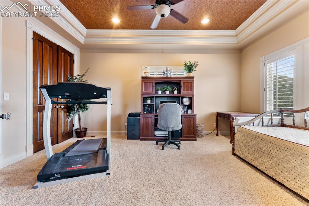 Image 31 of 50: Third bedroom with similar coffered ceilings as the primary bedroom