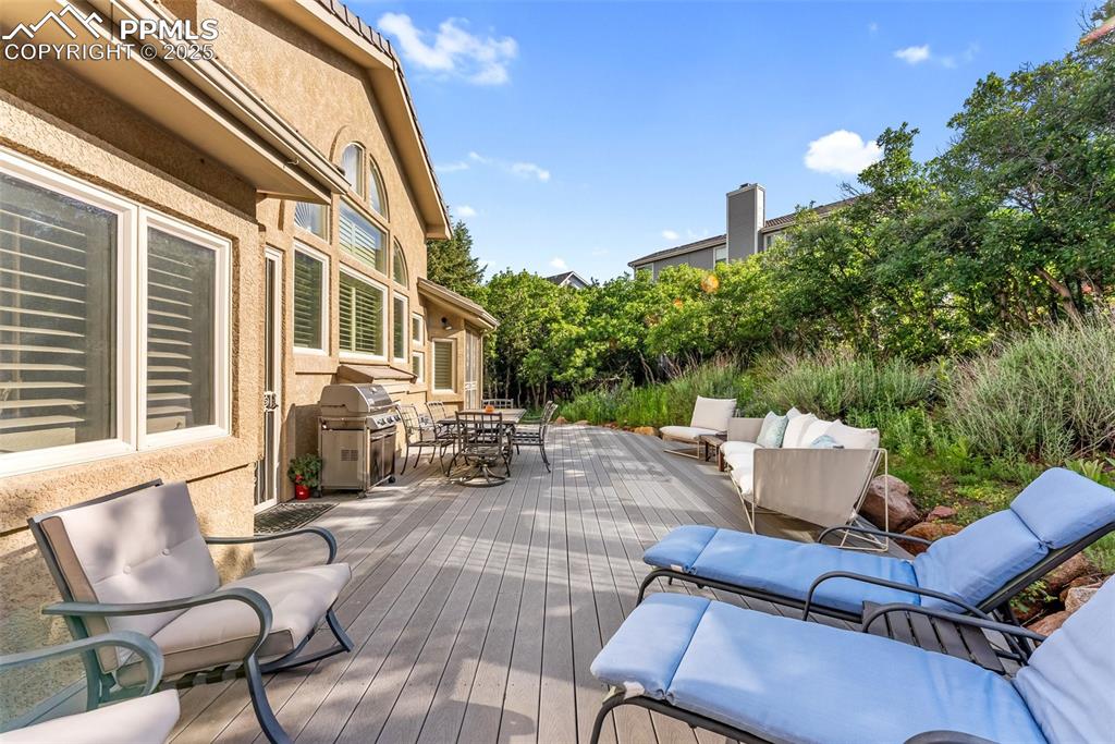 Image 45 of 50: Multiple walk-out access points to reach the backyard