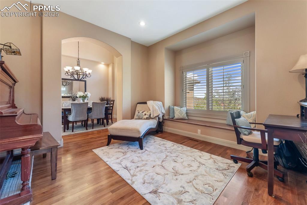 Image 5 of 50: Follow the front sitting room through to the formal dining room