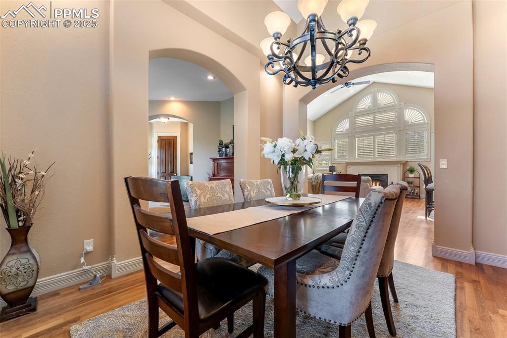 Image 7 of 50: Beautiful formal dining room leads into the large living room