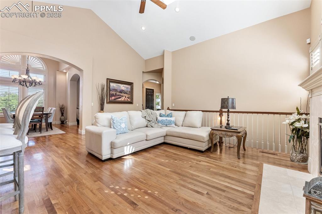 Image 8 of 50: Large living room with vaulted ceilings