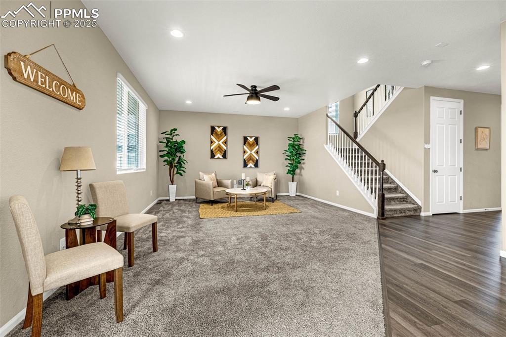 Image 6 of 42: Sitting room featuring recessed lighting, a ceiling fan, dark carpet, and s