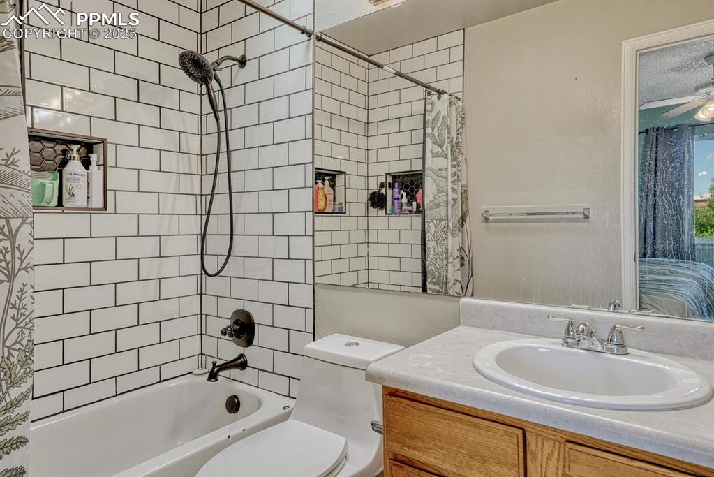 Image 25 of 47: Primary bathroom with new shower tile surround