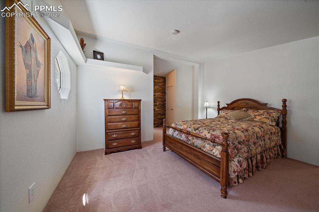 Image 16 of 50: View of carpeted bedroom
