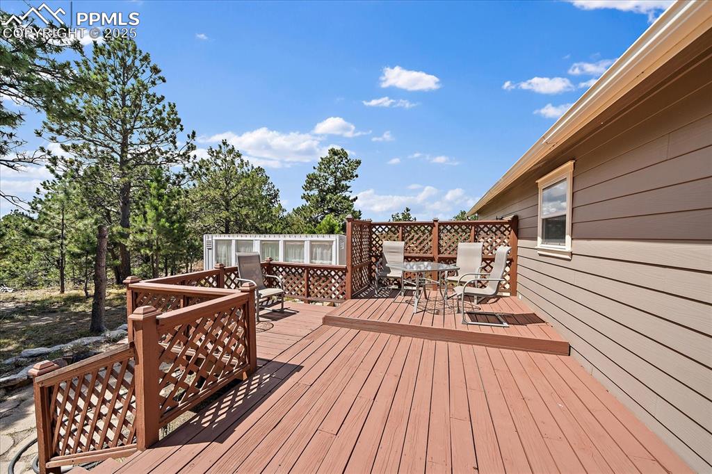 Image 28 of 50: View of wooden deck