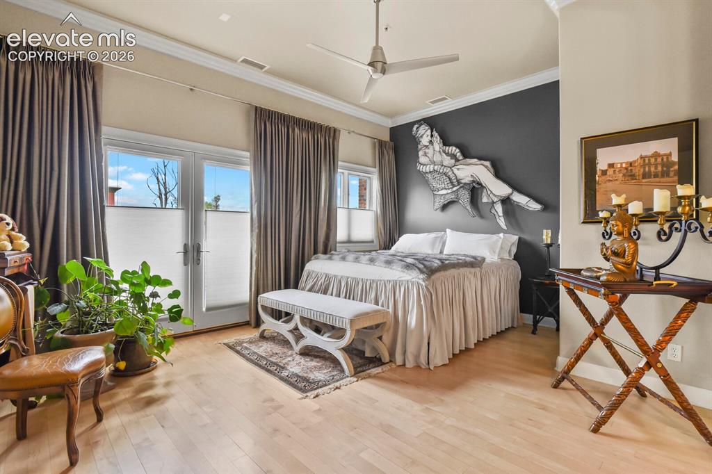 Image 14 of 29: Master Bedroom with Walk-out to Western views