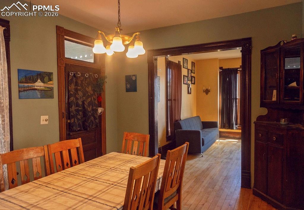 Image 12 of 38: Formal Dining Room with Walk-Out to Backyard (Looking Towards Living Room)