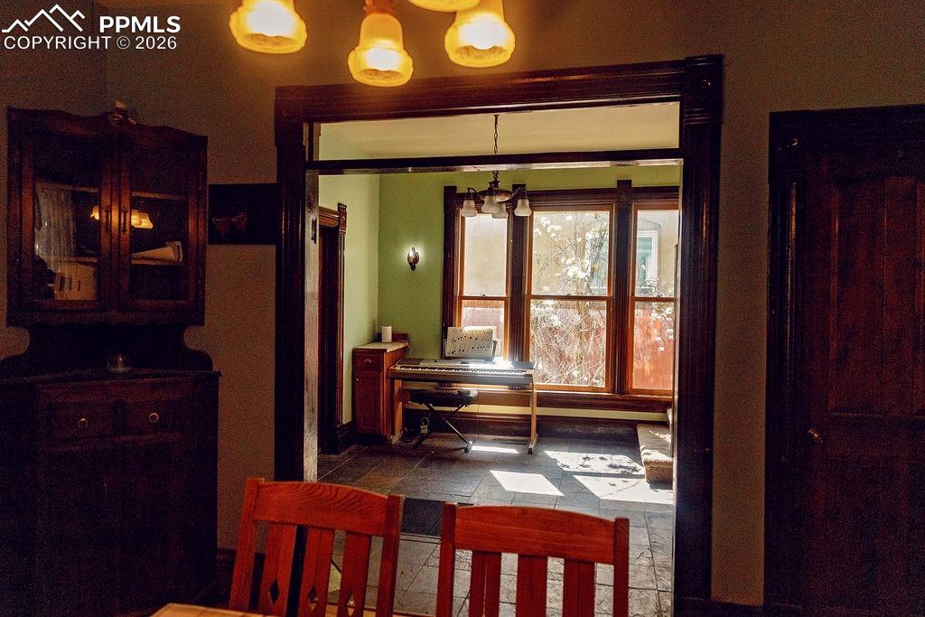 Image 13 of 38: Dining Room Looking Towards Sitting Room