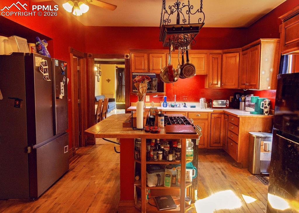 Image 19 of 38: Kitchen Looking Towards Dining Room