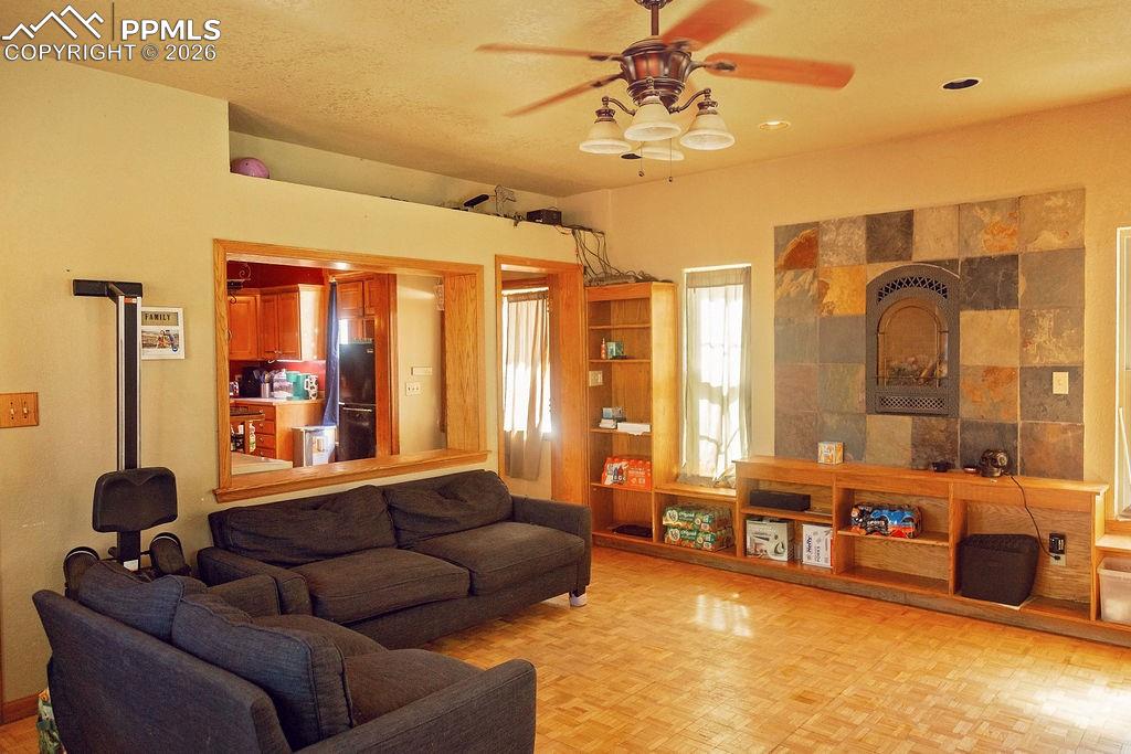 Image 22 of 38: Family Room with Fireplace