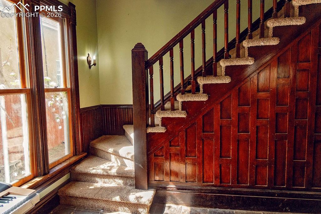 Image 24 of 38: Stairs to Upper Level (in Sitting Room)