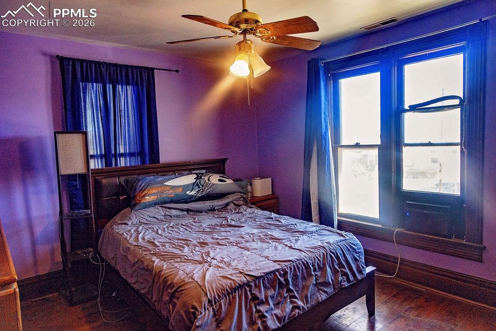 Image 26 of 38: Primary Bedroom with Ceiling Fan