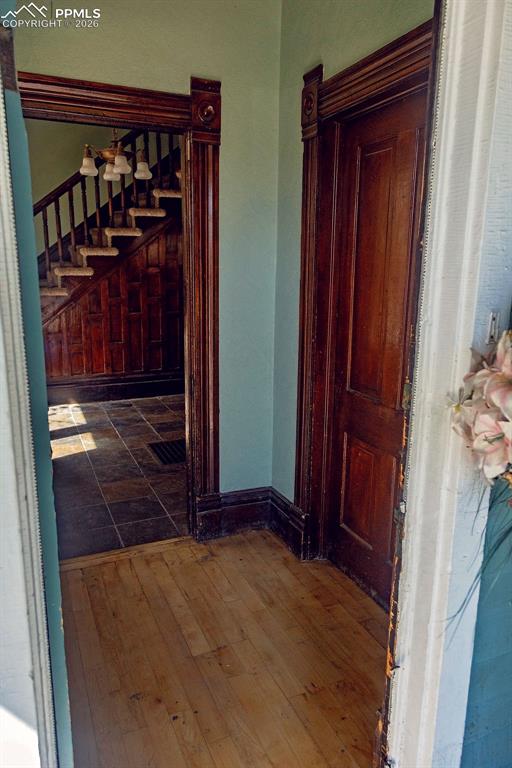 Image 4 of 38: Entry Area with Doors to Both Sitting & Living Rooms