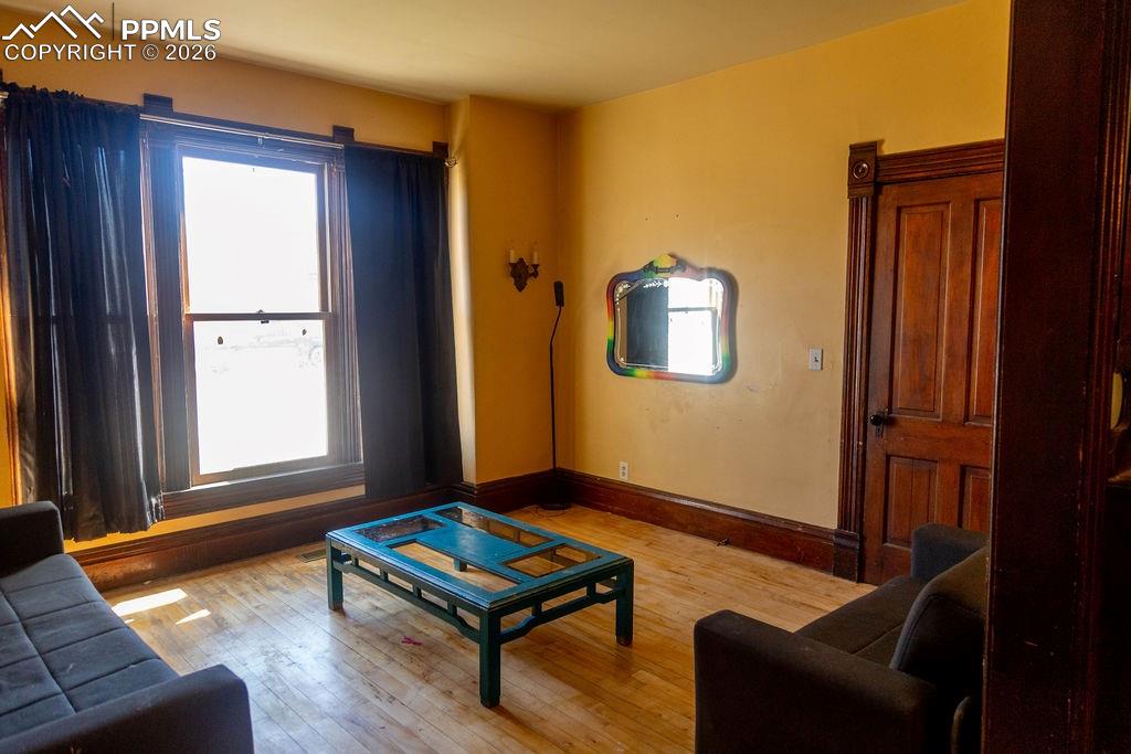 Image 7 of 38: Living Room (with Door to Entry Area)