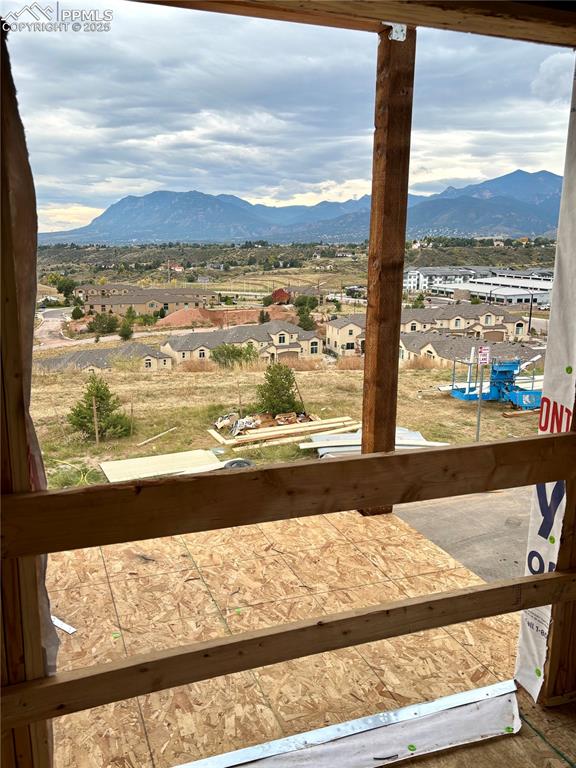 Image 7 of 16: View of mountain backdrop featuring nearby suburban area
