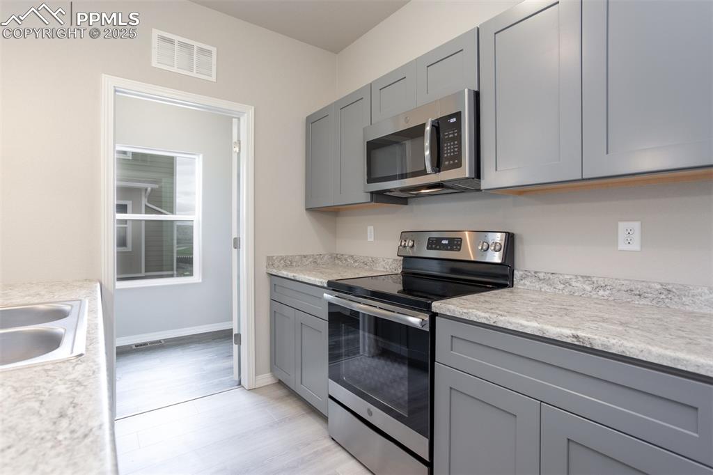 Image 9 of 17: **Photos of previous model home of same floor plan