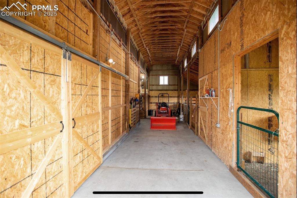 Image 38 of 44: View of horse barn