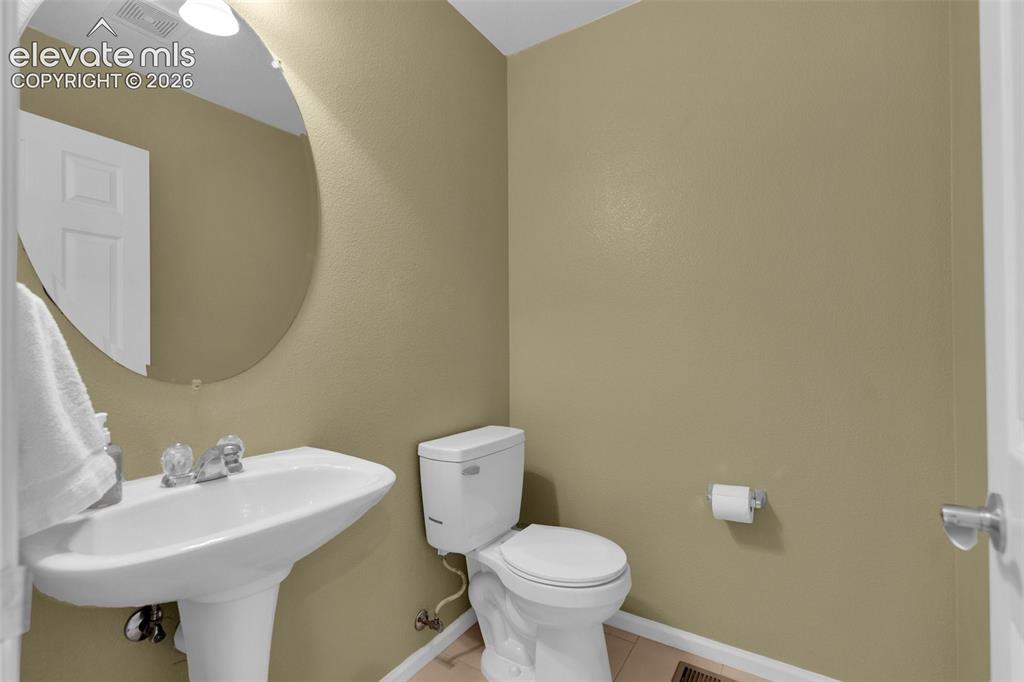 Image 16 of 30: Powder Bathroom on Main Level