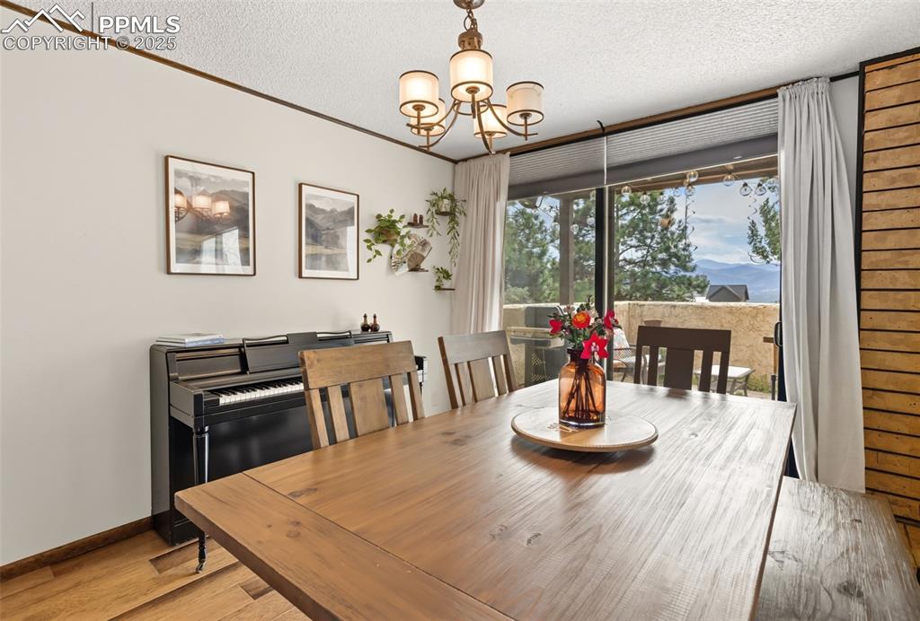 Image 11 of 26: Dining area also features access to patio