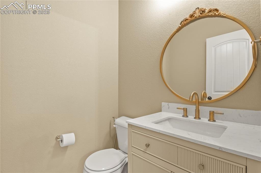 Image 20 of 39: Half bath on main level