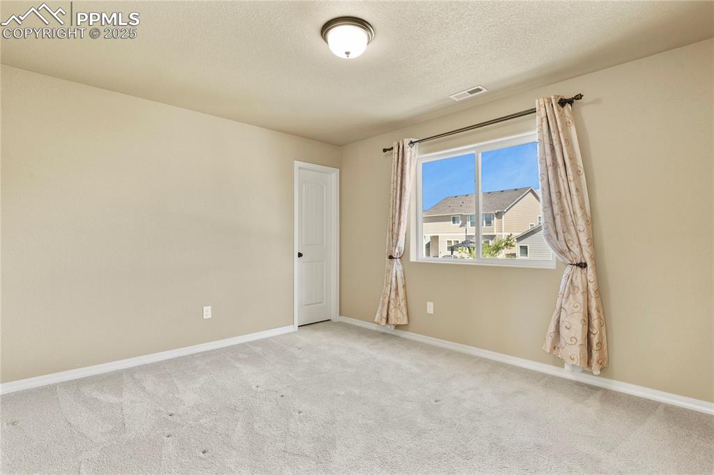 Image 31 of 39: Bedroom