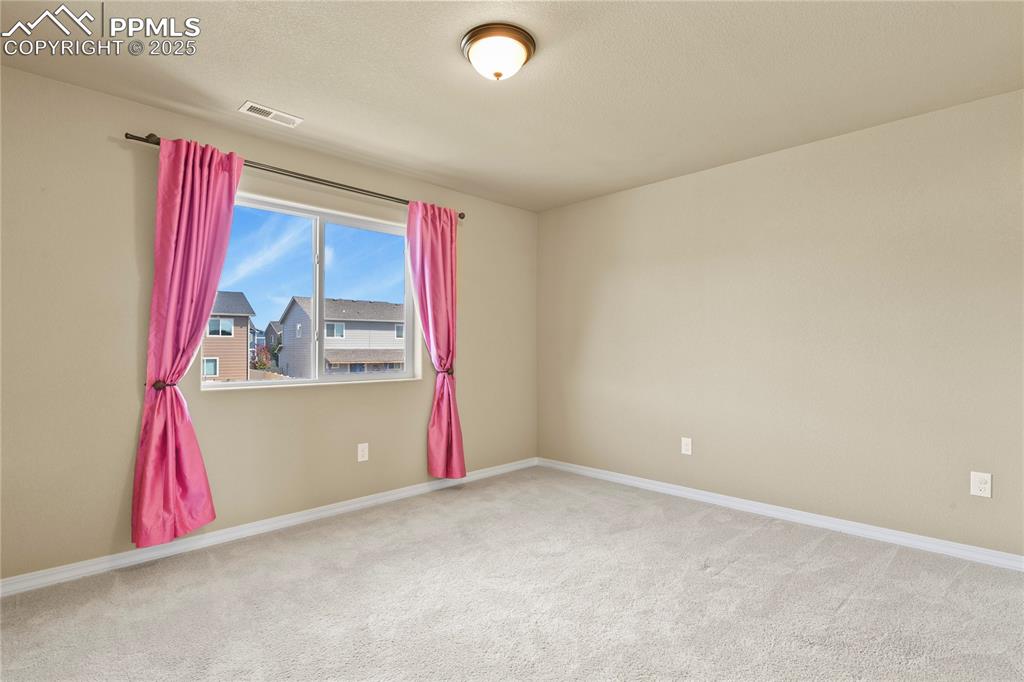 Image 34 of 39: Bedroom