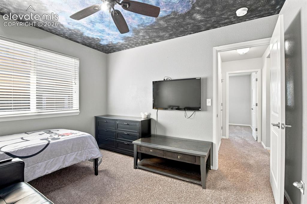 Image 21 of 32: Recessed ceiling fan with integrated lighting, wall-mounted television, car