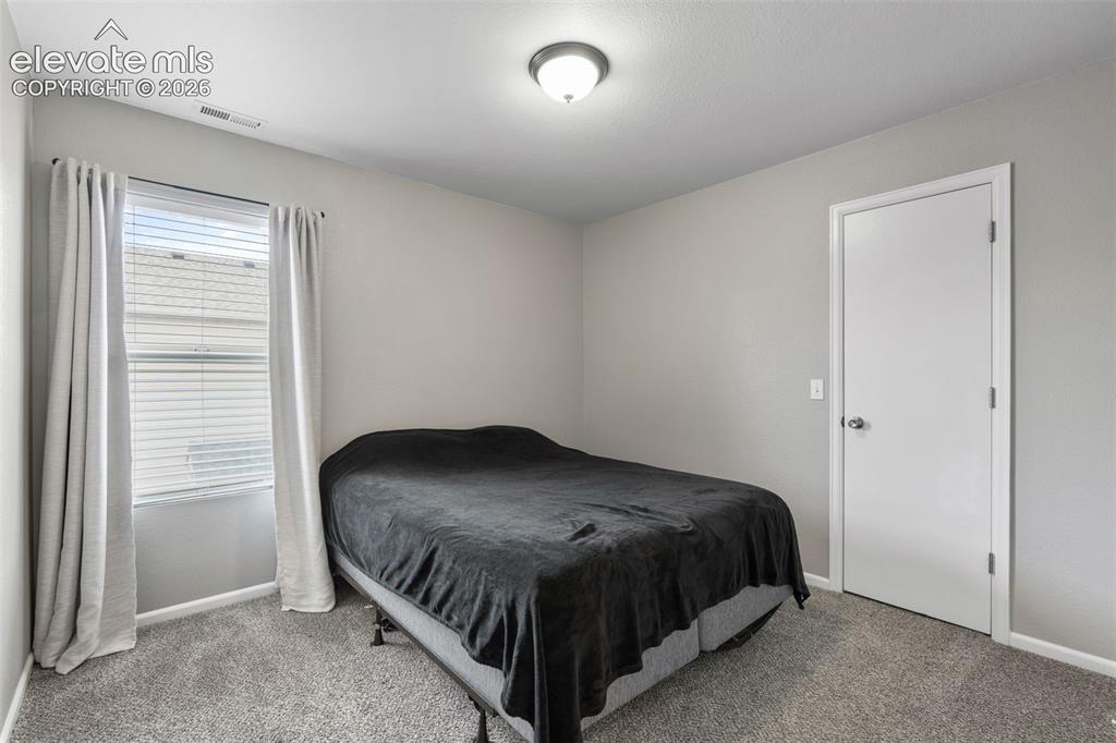 Image 21 of 27: Bedroom