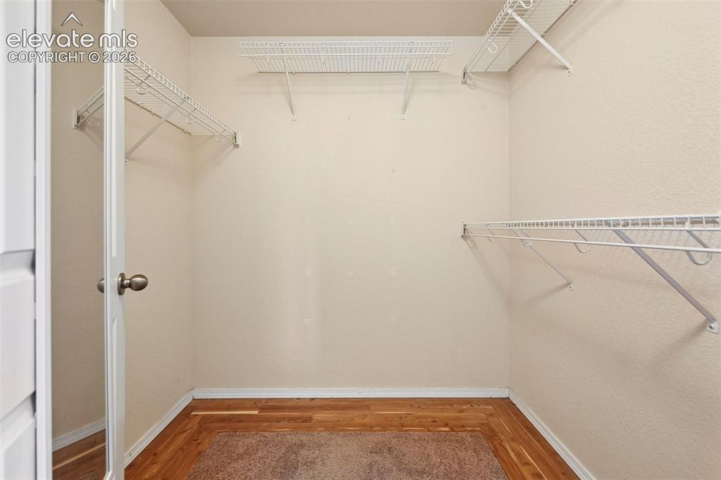 Image 12 of 36: Primary Bedroom Walk- In Closet