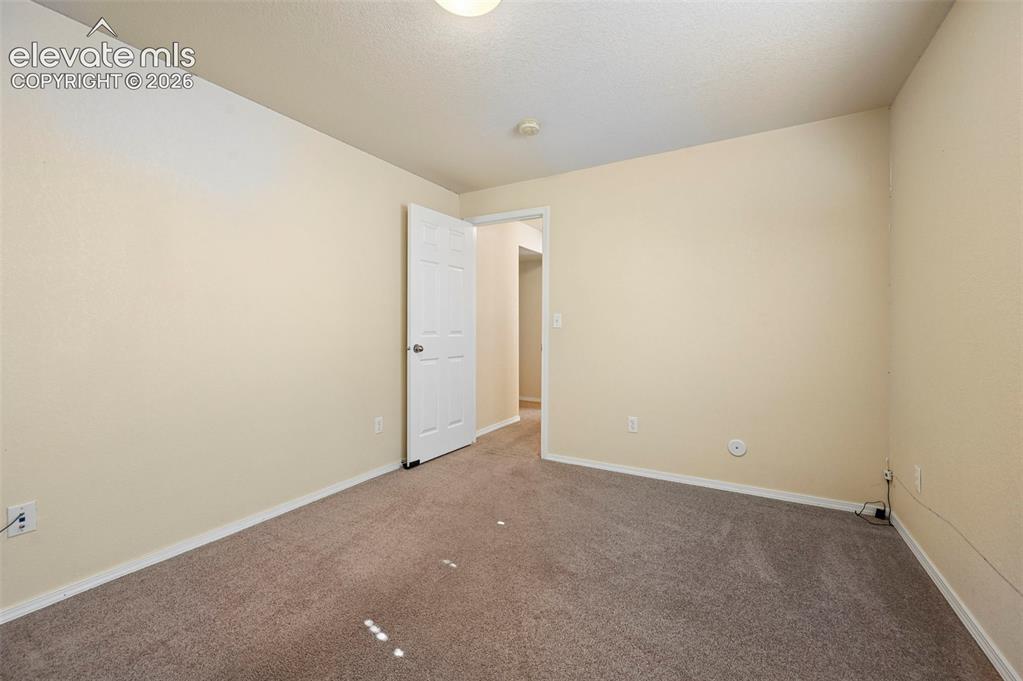 Image 25 of 36: Basement Bedroom