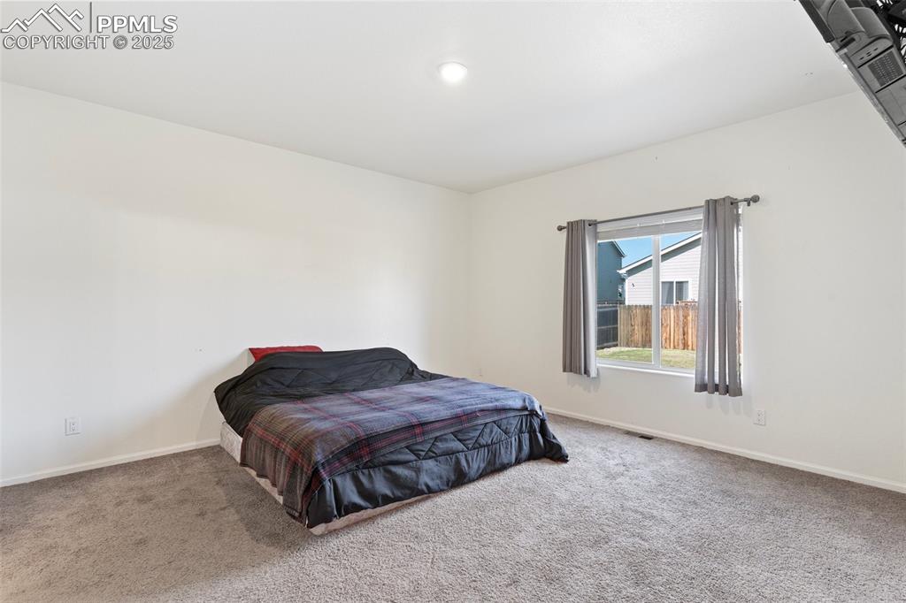 Image 22 of 48: Bedroom