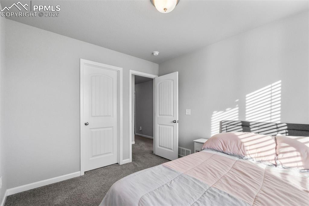 Image 25 of 34: Bedroom