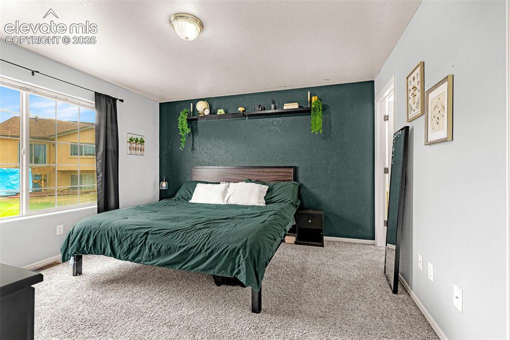 Image 8 of 33: Bedroom
