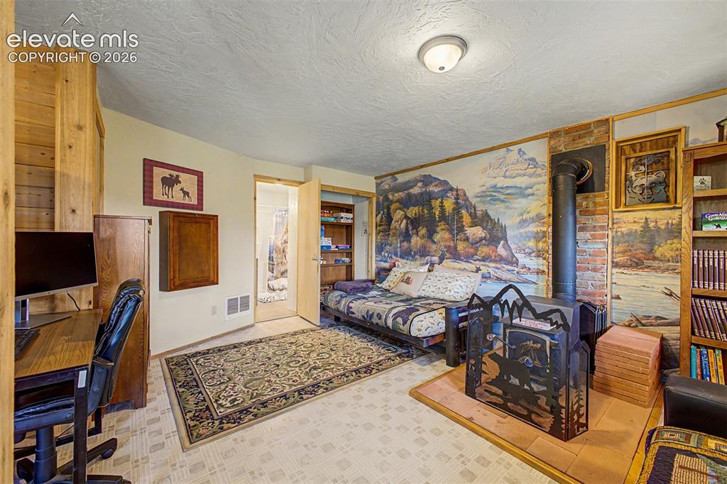 Image 38 of 50: Lots of additional sleeping space in the walkout basement