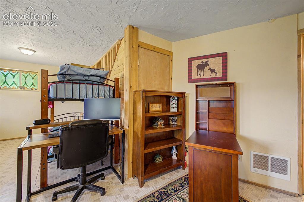 Image 39 of 50: Lots of additional sleeping space in the walkout basement
