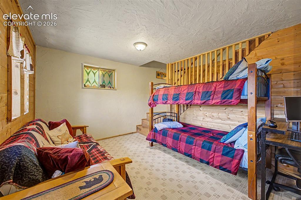 Image 41 of 50: Lots of additional sleeping space in the walkout basement