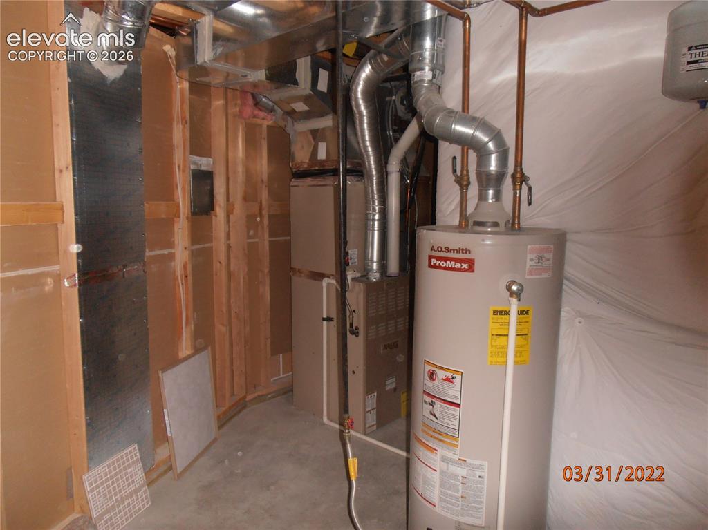 Image 11 of 11: Water heater and furnace systems