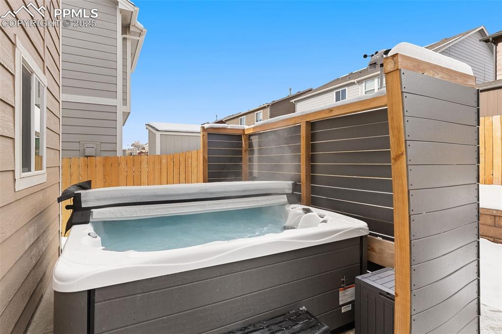 Image 28 of 35: Hot tub included