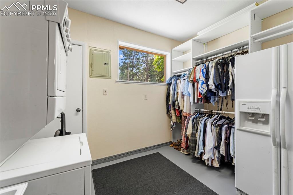 Image 25 of 41: Walk in closet featuring electric panel