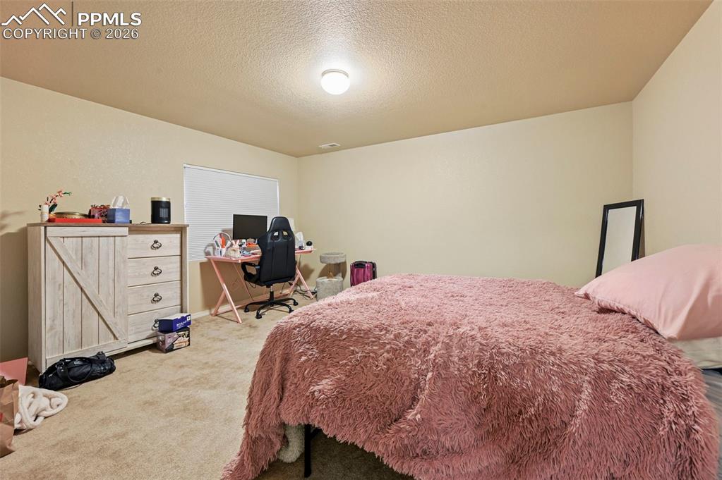 Image 32 of 37: Bedroom