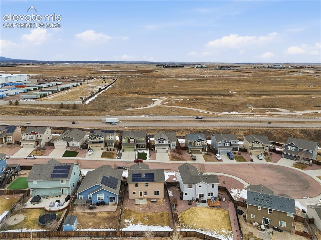 Image 44 of 45: Residential development featuring single-family homes with diverse exterior